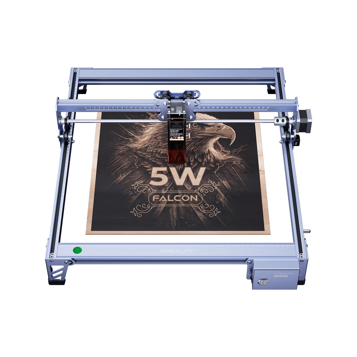 The Creality Falcon CR 5W Diode Laser Engraver etches an eagle image with "5W FALCON" onto wood. Its metallic frame ensures ultra-fine engraving precision, delivering impressive detail.