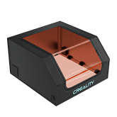 The Creality Falcon Protective Cover for Laser Engraver features a black design with a transparent orange-tinted shield and illuminated "Creality Falcon" branding, allowing real-time observation during laser engraving or printing.