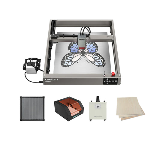 The Creality Falcon Falcon2 22W Diode Laser Engraver is shown engraving a vibrant butterfly on a metal plate, highlighting its colorful engraving abilities. Below it are accessories: filter, enclosure, control box, and plywood sheets.