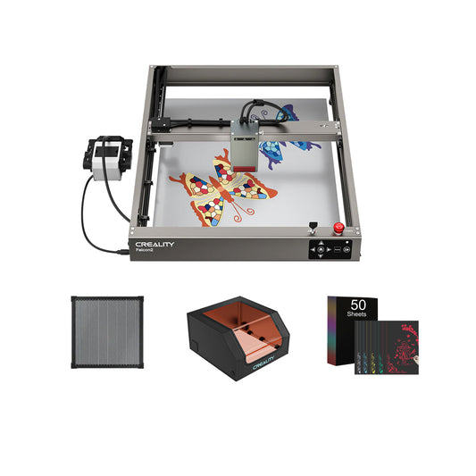 A Creality Falcon Falcon2 40W Diode Laser Engraver etches a colorful butterfly design, shown with metal honeycomb panel, protective cover, and 50 colored sheets; features an anodized aluminum alloy build.
