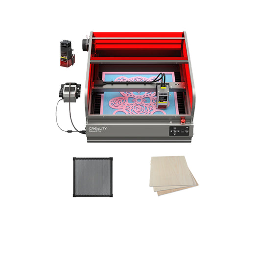 The Creality Falcon Falcon2 Pro 40W and 22W Enclosed Laser Engraver and Cutter, with its open red cover, illustrates Class 1 Safety while engraving a floral pattern on a sheet. Accompanying items include a small black component, a gridded black mat for visual assistance, and three wooden sheets positioned to the right of the machine. 1200