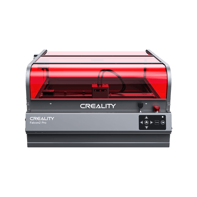 The Creality Falcon2 Pro Enclosed Diode Laser Engraver (60W/40W/20W) features a transparent red protective cover, visible internal components, front controls, and Class 1 laser safety, displayed against a white background.