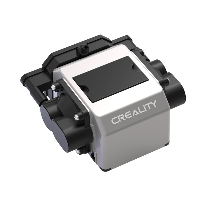 A Creality Falcon Air Assist for the CR-Laser Falcon 7.5W and 10W Engraver in a metallic finish features a compact design with black cylindrical components on the sides and a flat top surface. The brand name "CREALITY FALCON" is printed on the casing. Its low working noise ensures a quieter engraving environment.