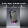 Image of the Creality Falcon Laser Module 40W for Falcon2 Laser Engravers features a sleek metallic design with a downward laser beam for ultra-fast, precise engraving. Text highlights its 40W power, adjustable light beam, and triple monitoring systems for vibrant engravings.