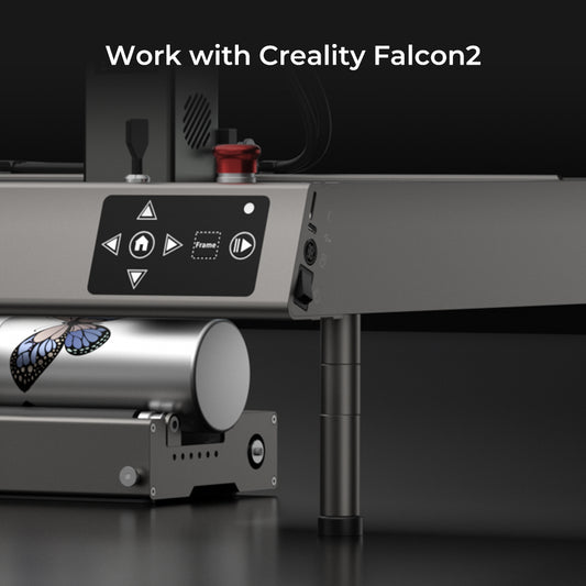 Close-up of a Creality Falcon2 3D printer featuring its control panel and part of a metallic cylinder adorned with a butterfly design. Above, the text "Work with Creality Falcon Risers for Falcon2 & Falcon2 Pro Series" is displayed, emphasizing its precision and adjustable height features.
