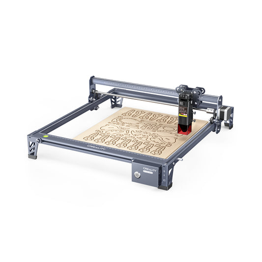 The Creality Falcon 10W CR-Laser Falcon Engraver Upgrade Package, with its sturdy metal frame and movable laser module, is engraving intricate patterns onto a flat wood sheet on its work surface. Includes a free test kit.