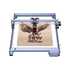 The Creality Falcon CR 10W Diode Laser Engraver, featuring advanced safety features, etches a flying falcon image and "10W Falcon" text onto a wooden board, viewed from above.