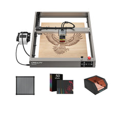 The Creality Falcon Falcon2 12W Laser Engraver and Cutter etches an eagle on wood, shown with Integrated Air Assist, filter, 50 material sheets, and a protective cover, all displayed against a white background.