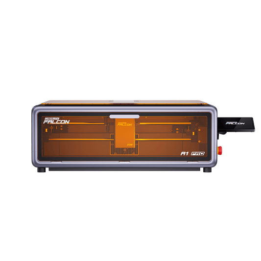 Front view of the Creality Falcon A1 Pro 20W Dual-laser Engraver, a rectangular machine with a transparent orange cover, visible internal parts, and a USB stick inserted on the right side. 1600