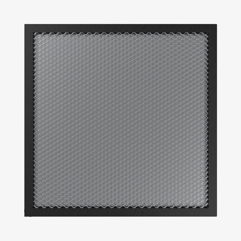 The CrealityFalcon 235x235 Honeycomb Workbench for Falcon A1 features a square metal sheet with a honeycomb design in a black frame. This pattern, viewed from above, offers a textured grid appearance that enhances both its aesthetics and heat dissipation properties.