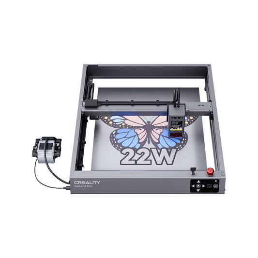 The Creality Falcon Falcon2 22W Laser Engraver and Cutter with integrated air assist etches a colorful butterfly and "22W" on a flat surface, showcasing its powerful cutting ability, precise control box, sturdy frame, and user-friendly buttons.