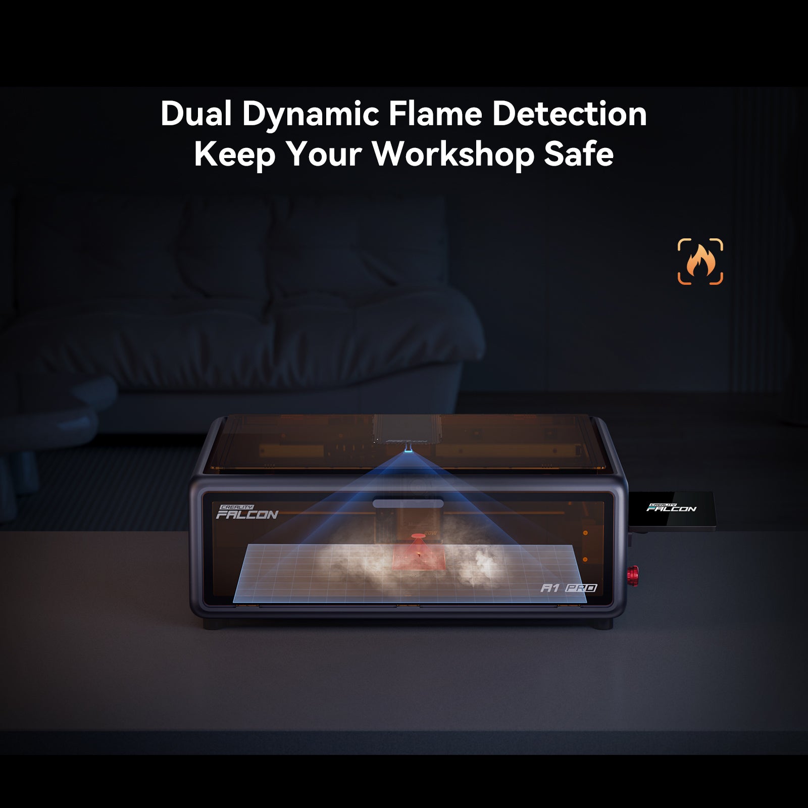 The Creality Falcon Falcon A1 Pro 20W Dual-laser Engraver sits on a table in a dim room, with "Dual Dynamic Flame Detection Keep Your Workshop Safe" in white text above and a flame detection icon to the right. Free Test Kit included.