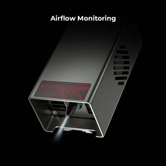 The Creality Falcon Laser Module 40W for Falcon2 Laser Engravers features a sleek, gray design with a red-tinted section and small vent showcasing its advanced capabilities. A light beam suggests ultra-fast engraving. "Airflow Monitoring" is prominently displayed above on a black background.