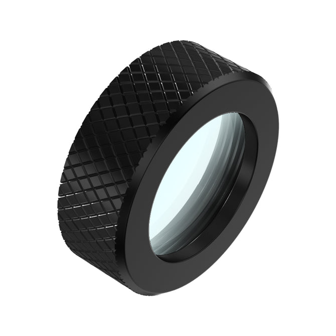 A textured black cylinder with a transparent center resembling the Creality Falcon CR-Laser Falcon Replace Protective Lens. The outer grid pattern enhances grip, and the glass center glimmers with light reflections.