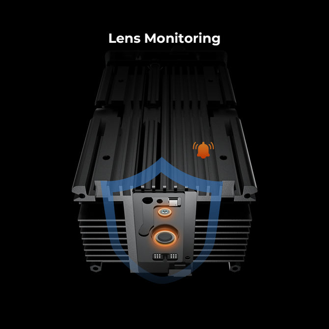 The Creality Falcon Laser Module 40W for Falcon2 Laser Engravers features a laser engraver's precision with "Lens Monitoring" above it. It includes a shield icon, an orange indicator light, and a small bug symbol, highlighting its ultra-fast capabilities.