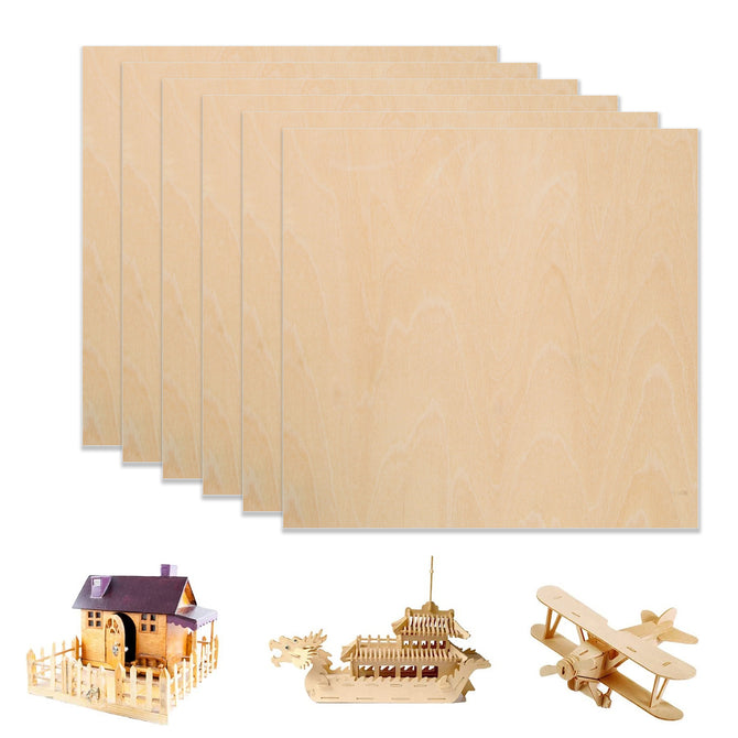 A fanned display of six Creality Falcon Basswood Plywood Sheets for Laser Engraving highlights three wooden models below: a small house, an intricate ship, and a biplane, all showcasing precision craftsmanship.