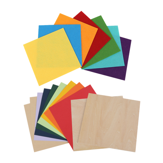 The Creality Falcon Laser Material Package displays two sets of square sheets: vividly colored felt on top, and colored paper, Kraft Paper, and two light basswood veneer sheets below—all arranged in overlapping fan shapes.