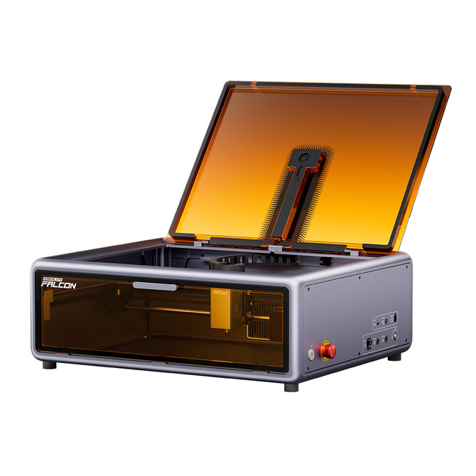 The Creality Falcon Falcon A1 10W Enclosed Diode Laser Engraver features a compact, modern design with an amber-tinted lid, auto material recognition, and convenient side control buttons and ports—ideal for any workspace.