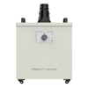 Front view of the Creality Falcon Smoke Purifier by Creality Falcon, designed for indoor use with a control panel, central dial, indicator lights, and large exhaust port to filter smoke and dust. The white unit features small wheels on the bottom corners.