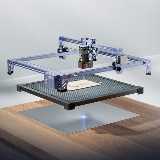 The CrealityFalcon 5W CR-Laser Falcon Engraver Upgrade Package engraves a wooden sheet placed on a metal grid over a wooden table, with a blue laser beam visible beneath the machine striking a metal plate below.