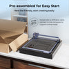 A partially unpacked CrealityFalcon 5W CR-Laser Falcon Engraver Upgrade Package sits on a table by an open box. It’s pre-assembled, beginner-friendly, and includes a USB data cable for simple computer connection.