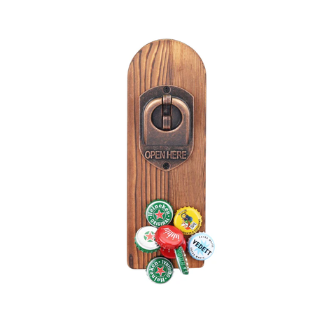 The Creality Falcon Vintage Wooden Bottle Opener with Catcher makes a unique gift, showcasing several colorful bottle caps, such as Heineken and Coca-Cola, gathered at its base. It features a vintage wooden style with the words "OPEN HERE" elegantly engraved above the opening mechanism.