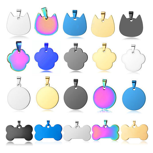 A collection of **CrealityFalcon 20pcs Titanium Steel Blank Stamping Tags Pets Tag Metal Pendant Charms for Falcon Laser Engraving** in various shapes and colors crafted with precision. The tags, including cat faces, round discs, bones, and paw prints, are available in iridescent, gold, silver, blue, black, and gray—each meticulously detailed by an expert engraver. 1601