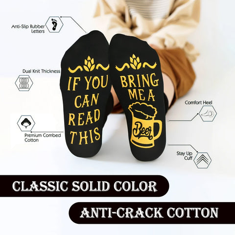 Wearing Creality Falcon socks with "If you can read this" on one sole and "Bring me a beer" on the other, these have anti-slip rubber letters, comfort heel, and a stay-up cuff. Ideal for men who enjoy relaxing with a cold one. Part of the Gift Set: Opener, Coaster, Wood Mug, Keychain.