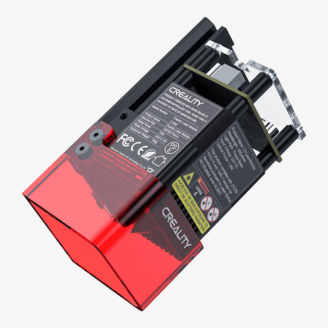 The image shows a Creality Falcon Laser Module 1.6W for more detailed projects, with a red translucent cover labeled "CREALITY." It features technical specs, safety warnings, and FCC symbols. Compatible machines are listed on the label, revealing black and metal components under the cover.