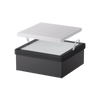 A black rectangular box with a removable white lid, featuring a grid-like surface and two pull tabs, shows the Creality Falcon Replacement Filter for Falcon A1 Air Purifier.