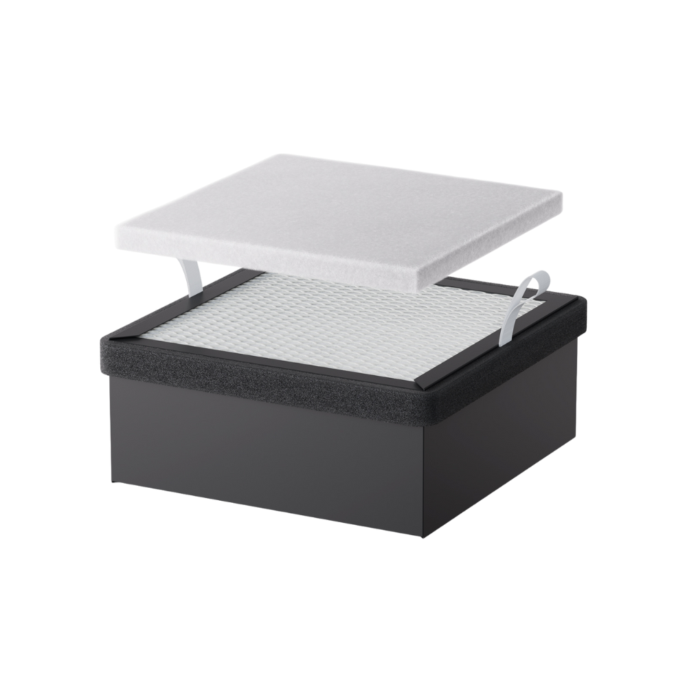 A black rectangular box with a removable white lid, featuring a grid-like surface and two pull tabs, shows the Creality Falcon Replacement Filter for Falcon A1 Air Purifier.