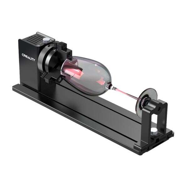 The Creality Falcon Rotary Kit Pro for Curved Surface Engraving, in black, uses adjustable jaws to hold a goblet-shaped object horizontally between two fixtures on a metal base.