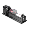 The Creality Falcon Rotary Kit Pro for Curved Surface Engraving, in black, uses adjustable jaws to hold a goblet-shaped object horizontally between two fixtures on a metal base.