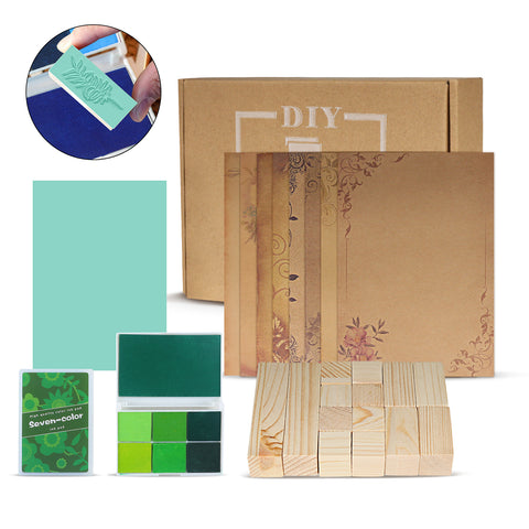 The Creality Falcon Wooden Rubber Stamp Set includes 14 pieces: brown boxes, a green stamp pad, assorted green ink pads, wooden blocks, and decorative paper. An image shows a hand using the kit’s stamps on detailed designs.