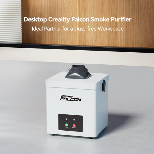 A Creality Falcon Desktop Smoke Purifier for Falcon A1 with black vents, labeled buttons, and indicator lights sits on a light desk in a modern wood-paneled room. Text above promotes Creality Falcon as a dust-free workspace solution.