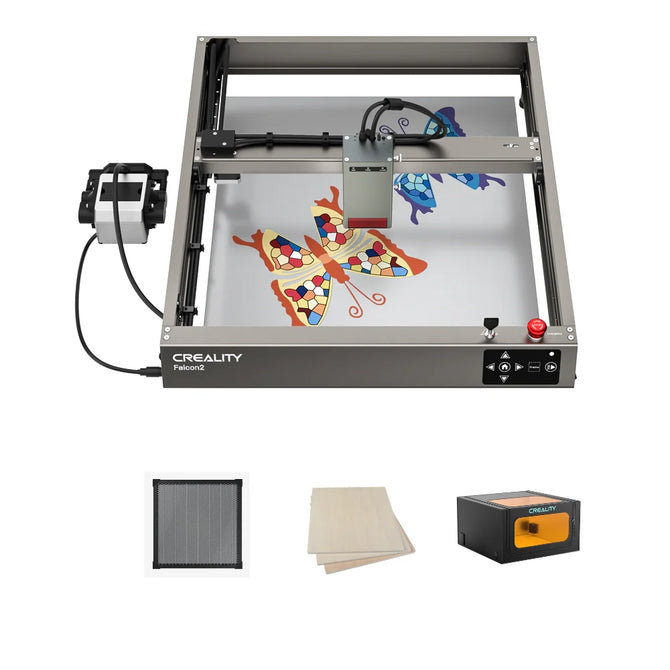 A Creality Falcon2 40W Diode Laser Engraver with a vibrant butterfly design being engraved. Shown with three accessories: a filter, wooden sheets, and a Creality-branded box. Built with an anodized aluminum alloy for stability.