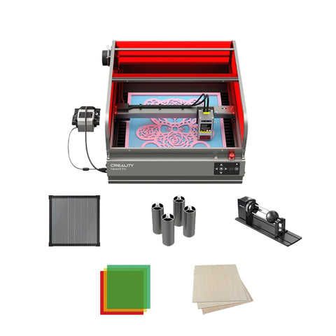 The image features the Falcon2 Pro 22W Enclosed Laser Engraver and Cutter Bundle by Creality Falcon, highlighting the creative freedom it provides with a detailed pattern in progress. Various accessories are displayed below, including metal mesh, cylindrical objects, colored sheets, and wooden panels. All components adhere to Class 1 safety standards for optimal peace of mind while working on multiple engraving projects.