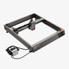 The Creality Falcon Falcon2 22W Diode Laser Engraver, shown in gray with an open-frame design and control buttons plus a power unit, demonstrates strong cutting power against a plain white background.