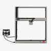 The Creality Falcon Falcon2 22W Diode Laser Engraver features a metal frame, visible wiring, control box on the left, and a red knob at the bottom right, all shown against a white background. It offers broad compatibility for diverse engraving projects.