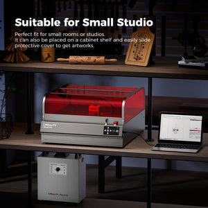 The Falcon2 Pro 22W Enclosed Laser Engraver and Cutter Bundle by Creality Falcon is showcased on a shelf in a studio setting, surrounded by intricately engraved wooden artworks and various studio items. The image text emphasizes its Class 1 Safety, making it perfect for small studios and convenient shelf placement, allowing for limitless creative possibilities.